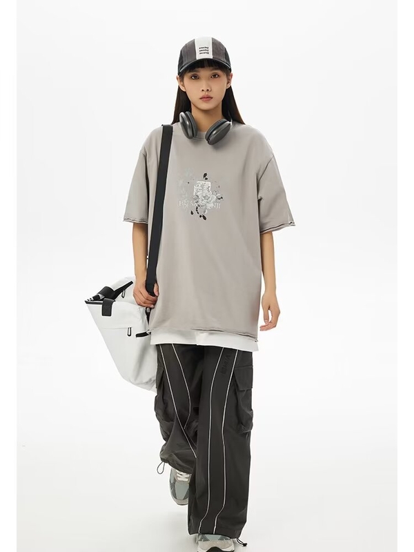 Új női tavaszi/nyári karcsúsított lezser nadrág, amerikai high street stílus, bő egyenes szárú, laza fazonú, cargo nadrág húzózsinórral és széles szárral.