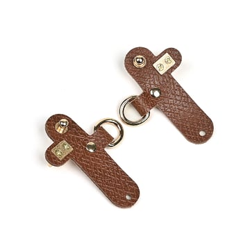 Longchamp somu, modificētu ar necaurdurošu īstas ādas sprādzi un platu mini plecu siksnu, pārrobežu vairumtirdzniecības pasūtījumi.