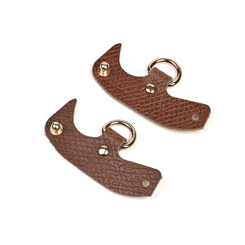 Longchamp somu, modificētu ar necaurdurošu īstas ādas sprādzi un platu mini plecu siksnu, pārrobežu vairumtirdzniecības pasūtījumi.