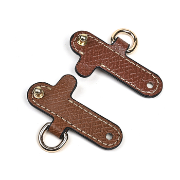 Longchamp somu, modificētu ar necaurdurošu īstas ādas sprādzi un platu mini plecu siksnu, pārrobežu vairumtirdzniecības pasūtījumi.