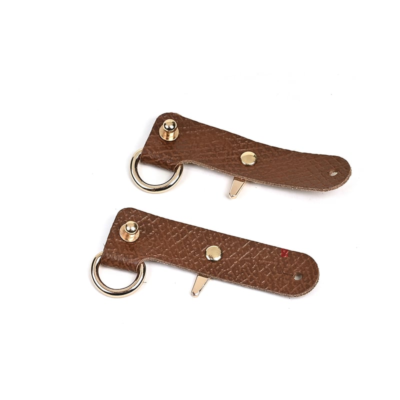 Longchamp somu, modificētu ar necaurdurošu īstas ādas sprādzi un platu mini plecu siksnu, pārrobežu vairumtirdzniecības pasūtījumi.