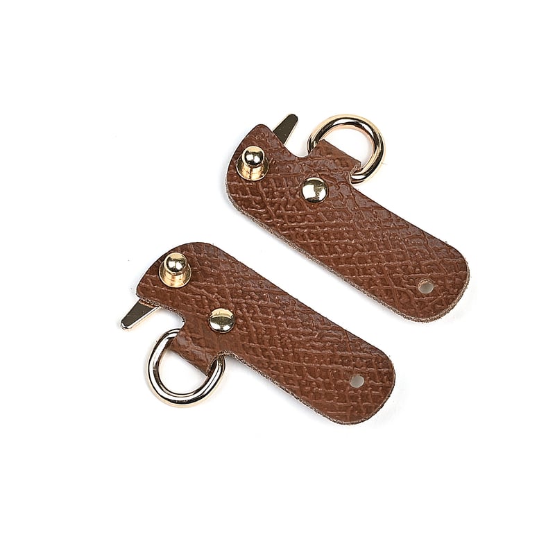 Longchamp somu, modificētu ar necaurdurošu īstas ādas sprādzi un platu mini plecu siksnu, pārrobežu vairumtirdzniecības pasūtījumi.