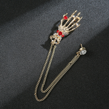 Vyriški personalizuoti kostiumai, derinami su kutais, gitaromis, muzikos instrumentų papuošalais, grandininėmis sagėmis, susukto rutulio sagėmis ir kitais aksesuarais.