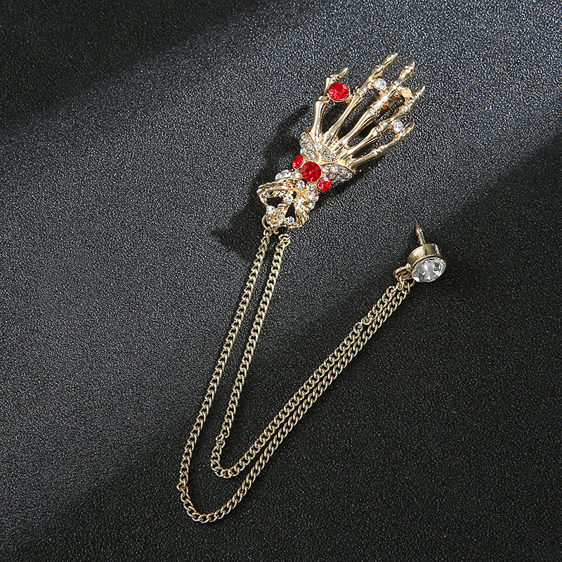 Vyriški personalizuoti kostiumai, derinami su kutais, gitaromis, muzikos instrumentų papuošalais, grandininėmis sagėmis, susukto rutulio sagėmis ir kitais aksesuarais.