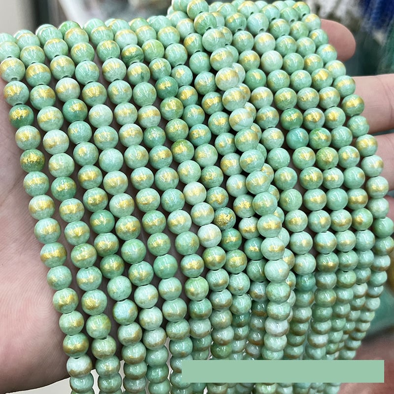 Uus piiriülene toode: kuldsed jade ümmargused helmed, optimeeritud kuldpulberhelmed, jade helmeste nöör, poolvalmis isetegemise ehete aksessuaaride hulgimüük.