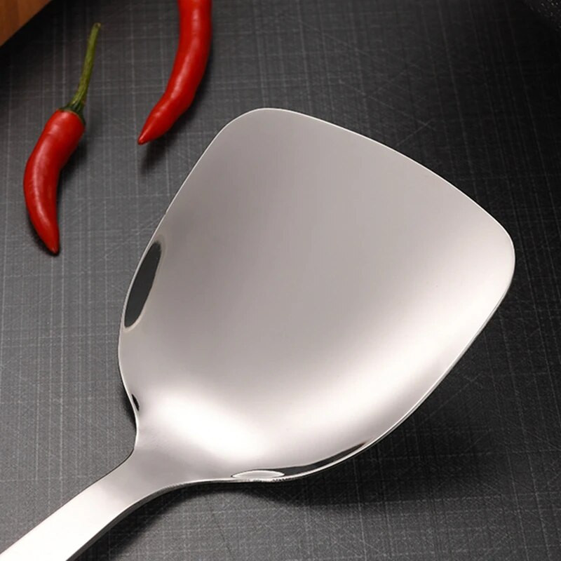 Ēdienu gatavošanas rīku komplekts ar melnu rokturi Nerūsējošā tērauda cepšanas lāpstiņa zupas karote Mājas pārtikas lāpsta Caurduris Jauni virtuves piederumi