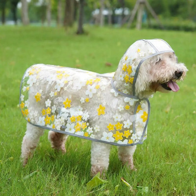 Moodne koerte vihmajope Stiilne lillemustriline läbipaistev lemmikloomakeep koos pukseerimisauguga. Ideaalselt liibuv koera vihmamantel Teddyle