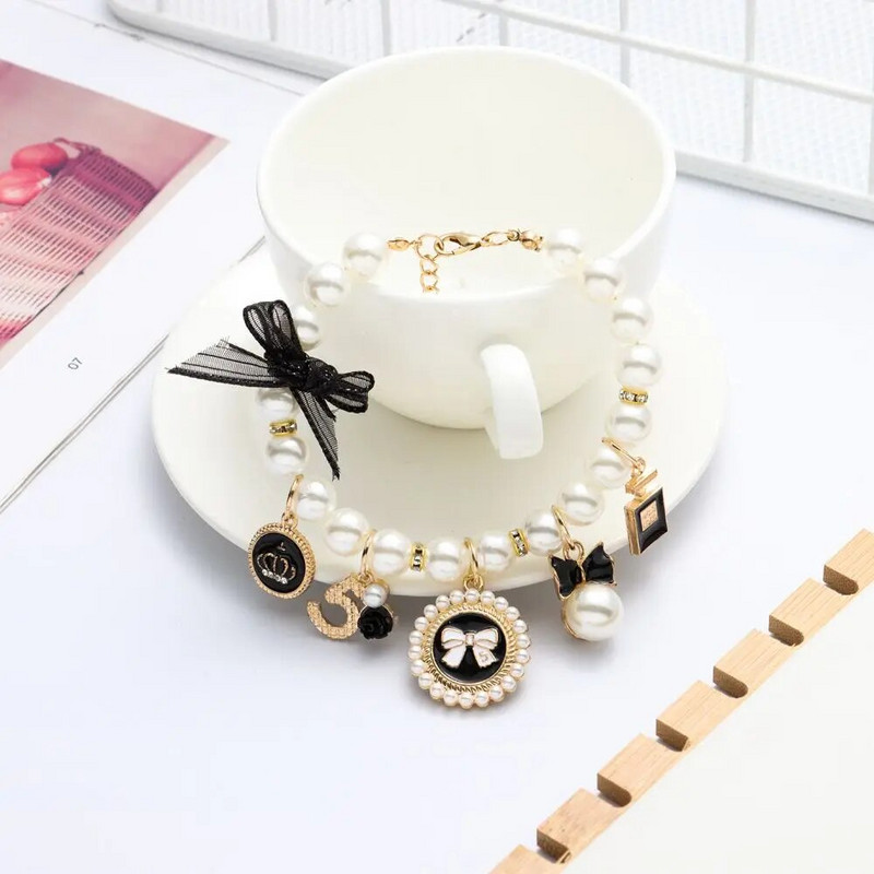 Divat kiskutya kiegészítők Aranyos nyakörv Állítható kutya macska hercegnő masni nyaklánc kisállat gyöngy nyakörv