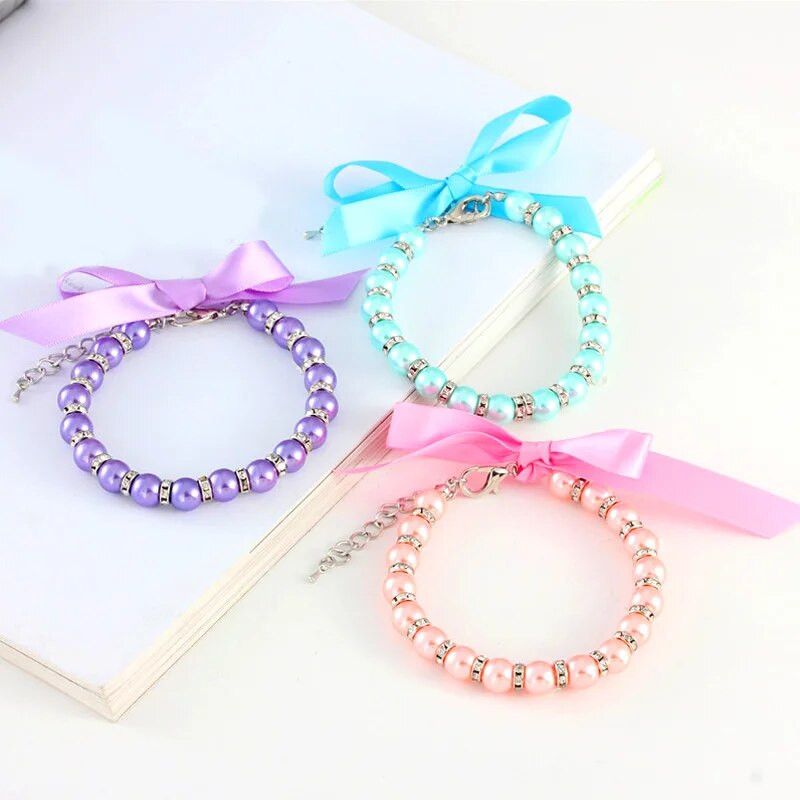 Сладък домашен любимец Перлена огърлица Панделка Лък Котка Нашийник за куче Странични кристали Регулируема верига Яка Вратовръзка Бижута за домашни любимци