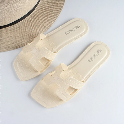 Női PVC papucsot viselnek kint a nyáron Új otthon Divat Square Head Plaids Lapos szabadidős strandpapucs