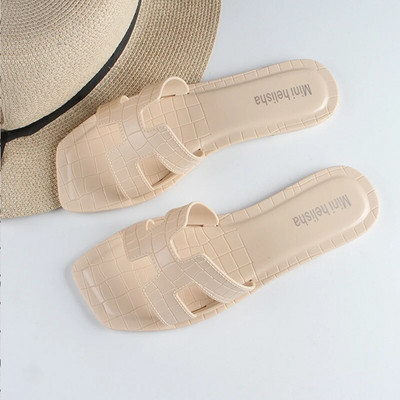 Női PVC papucsot viselnek kint a nyáron Új otthon Divat Square Head Plaids Lapos szabadidős strandpapucs