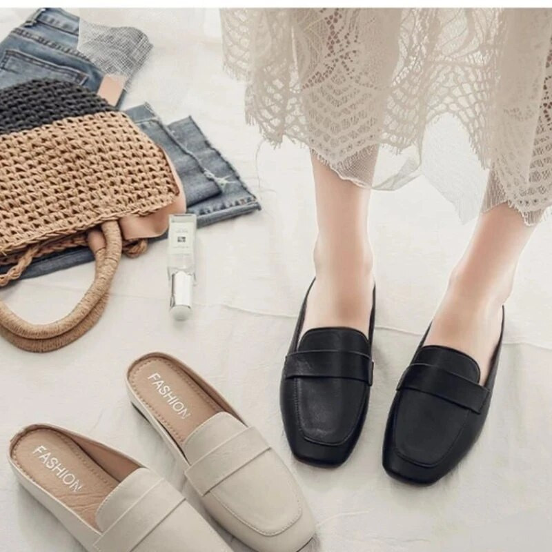 2024-es új nyári Baotou papucsok divatos, lapos aljú, puha bőr kimenő női papucsokkal