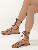 Keresztpántos, fűzős szandál lapos, csíptetős orrú bokatekercs Női szandál római stílusú nyári női cipő