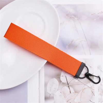 Lentes siksnas Rokas atslēgu piekariņš Cieta siksna Automašīnas atslēgu piekariņi Rokas plaukstas atslēgu turētājs Sieviešu štrope Meiteņu atslēgu soma Mobilais tālrunis