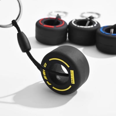 Luksusa Mini F1 sacīkšu riepu atslēgu piekariņš Automašīnas atslēgu aksesuāri PVC riepu kulonu soma šarms vīriešu sīkrīki Dāvanas draugiem automašīnu mīļotājiem