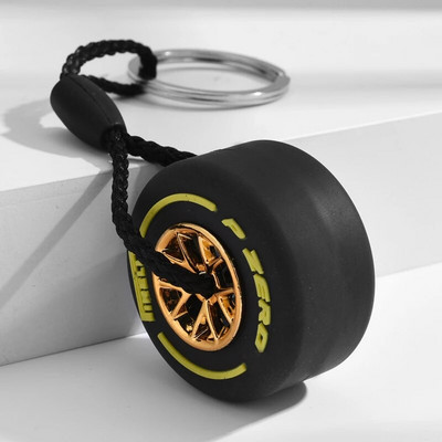 Luksusa Mini F1 sacīkšu riepu atslēgu piekariņš Automašīnas atslēgu aksesuāri PVC riepu kulonu soma šarms vīriešu sīkrīki Dāvanas draugiem automašīnu mīļotājiem