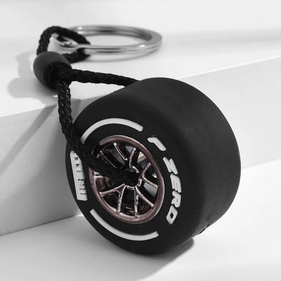 Luksusa Mini F1 sacīkšu riepu atslēgu piekariņš Automašīnas atslēgu aksesuāri PVC riepu kulonu soma šarms vīriešu sīkrīki Dāvanas draugiem automašīnu mīļotājiem