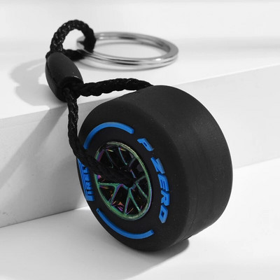 Luksusa Mini F1 sacīkšu riepu atslēgu piekariņš Automašīnas atslēgu aksesuāri PVC riepu kulonu soma šarms vīriešu sīkrīki Dāvanas draugiem automašīnu mīļotājiem