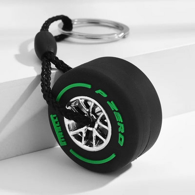 Luksusa Mini F1 sacīkšu riepu atslēgu piekariņš Automašīnas atslēgu aksesuāri PVC riepu kulonu soma šarms vīriešu sīkrīki Dāvanas draugiem automašīnu mīļotājiem