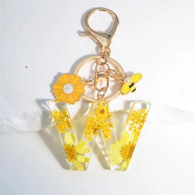 Χαριτωμένο τεχνητό μενταγιόν μαργαριτάρι μελισσών 26 γράμματα Μπρελόκ Μόδα μαργαρίτα με λουλούδι μπρελόκ με ρητίνη Γυναικεία ανδρική τσάντα αυτοκινήτου Γραφικό στοιχείο τηλεφώνου