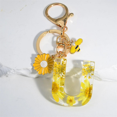 Χαριτωμένο τεχνητό μενταγιόν μαργαριτάρι μελισσών 26 γράμματα Μπρελόκ Μόδα μαργαρίτα με λουλούδι μπρελόκ με ρητίνη Γυναικεία ανδρική τσάντα αυτοκινήτου Γραφικό στοιχείο τηλεφώνου