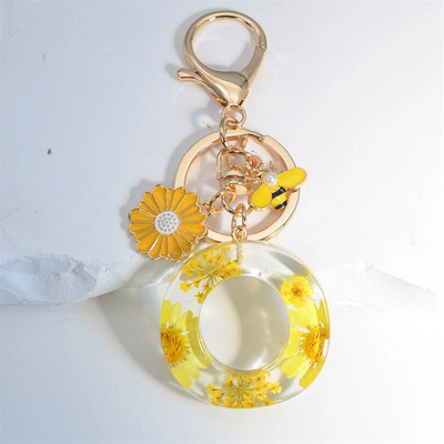 Χαριτωμένο τεχνητό μενταγιόν μαργαριτάρι μελισσών 26 γράμματα Μπρελόκ Μόδα μαργαρίτα με λουλούδι μπρελόκ με ρητίνη Γυναικεία ανδρική τσάντα αυτοκινήτου Γραφικό στοιχείο τηλεφώνου