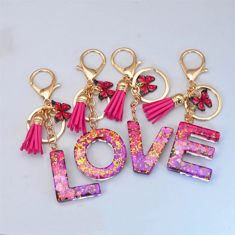 Svjetlucavi AZ Sjajni privjesak sa šljokicama i slovom Privjesak za ključeve s resicama Zvjezdica s loptom Privjesci za ključeve Ženska torba Ukrasi Drangulije za automobil Dodaci