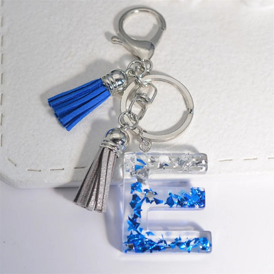 Radoši 26 burtu sveķu atslēgu piekariņi ar pušķi.