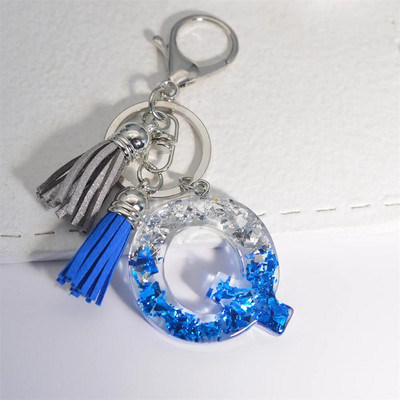 Radoši 26 burtu sveķu atslēgu piekariņi ar pušķi.