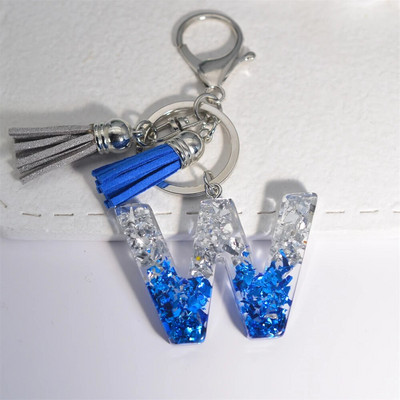 Radoši 26 burtu sveķu atslēgu piekariņi ar pušķi.