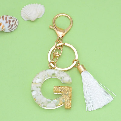 Angļu burtu atslēgu piekariņš ar baltu pušķu kristālu AZ atslēgu piekariņš mirdzoši fliteriem aizpildāmi atslēgu piekariņi meitenēm dāvanas maisiņu piekariņi