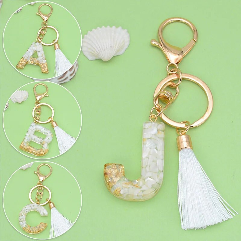 Angļu burtu atslēgu piekariņš ar baltu pušķu kristālu AZ atslēgu piekariņš mirdzoši fliteriem aizpildāmi atslēgu piekariņi meitenēm dāvanas maisiņu piekariņi