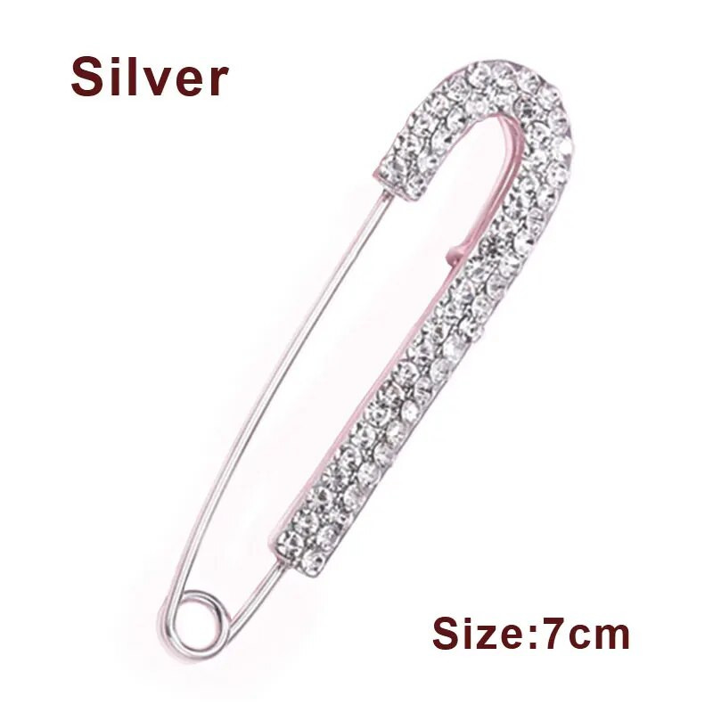 1 tk lihtsad kivist suured haaknõelad, tühjenevad nööpnõelad, pandlaga naiste kampsun kardigan, suur nööpnõelaga pross, fikseeritud riided