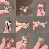 Kristāla jaukas trusis sirds ziedu kaķu saktas sievietēm Luksusa zelta krāsas sakausējums Dzīvnieku atloka piespraudes Pretspīduma apģērba aksesuāri