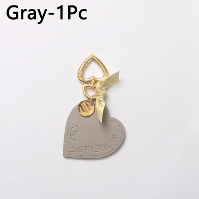 Creative Love ādas atslēgu piekariņš unikāls sirds formas sprādzes atslēgu piekariņš sievietēm Austiņu maka soma Atslēgu turētājs ballītes dāvanu aksesuārs