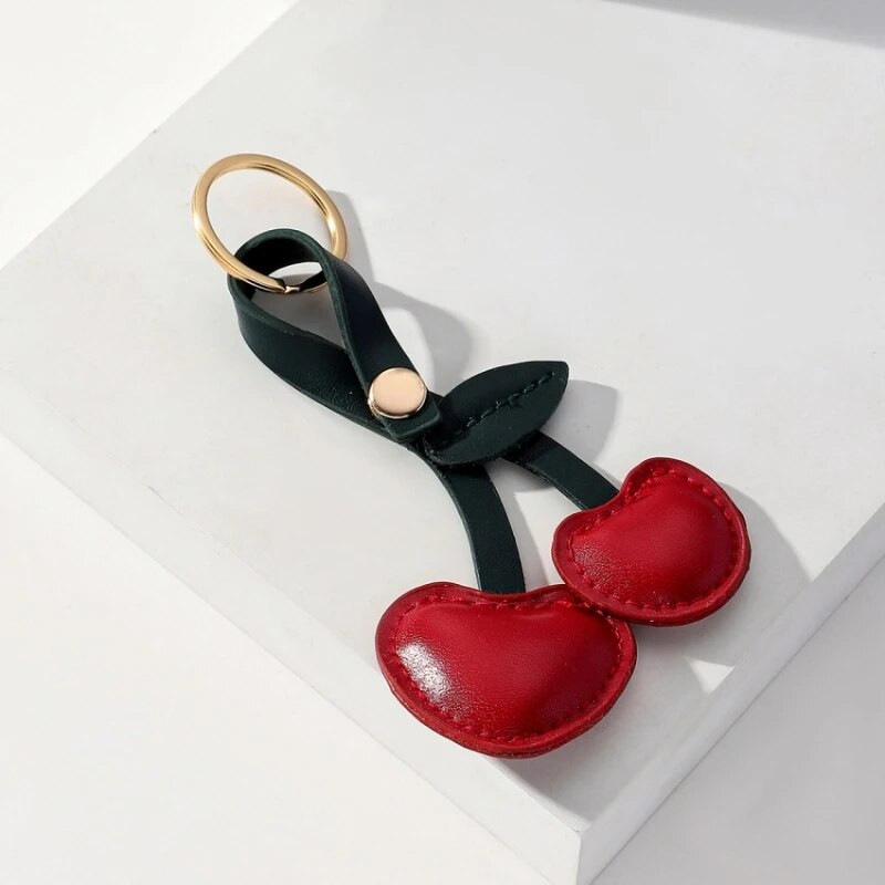 Novosti Rustikalni kožni privjesak za ključeve Trešnja Vodeća modna muška i ženska torba za automobil Privjesak za ključeve Nakit Poklon