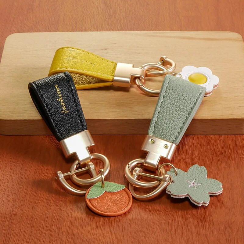 Luksusa metāla īss ādas ziedu oranžs auto atslēgu piekariņš kulons, sadalīts atslēgu piekariņš sievietei, meitenei, siksniņa, modes atslēgu piekariņa aksesuāri