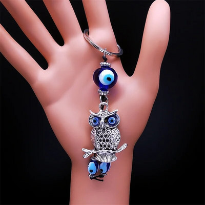 Pūces zilo acu atslēgu piekariņš sievietēm/vīriešiem Sudraba krāsas sakausējums Lucky Protection atslēgu piekariņš Rotaslieta porte clé pour femme KXH524S01