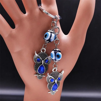 Pūces zilo acu atslēgu piekariņš sievietēm/vīriešiem Sudraba krāsas sakausējums Lucky Protection atslēgu piekariņš Rotaslieta porte clé pour femme KXH524S01
