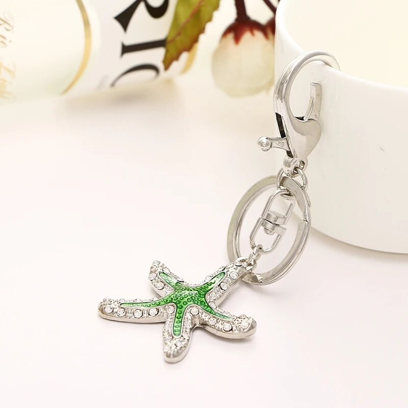 2020. gada modes jaunas krāsas kalnu kristāls, jauks, pilināms eļļas jūras zvaigzne, metāla soma, maka atslēgu piekariņš