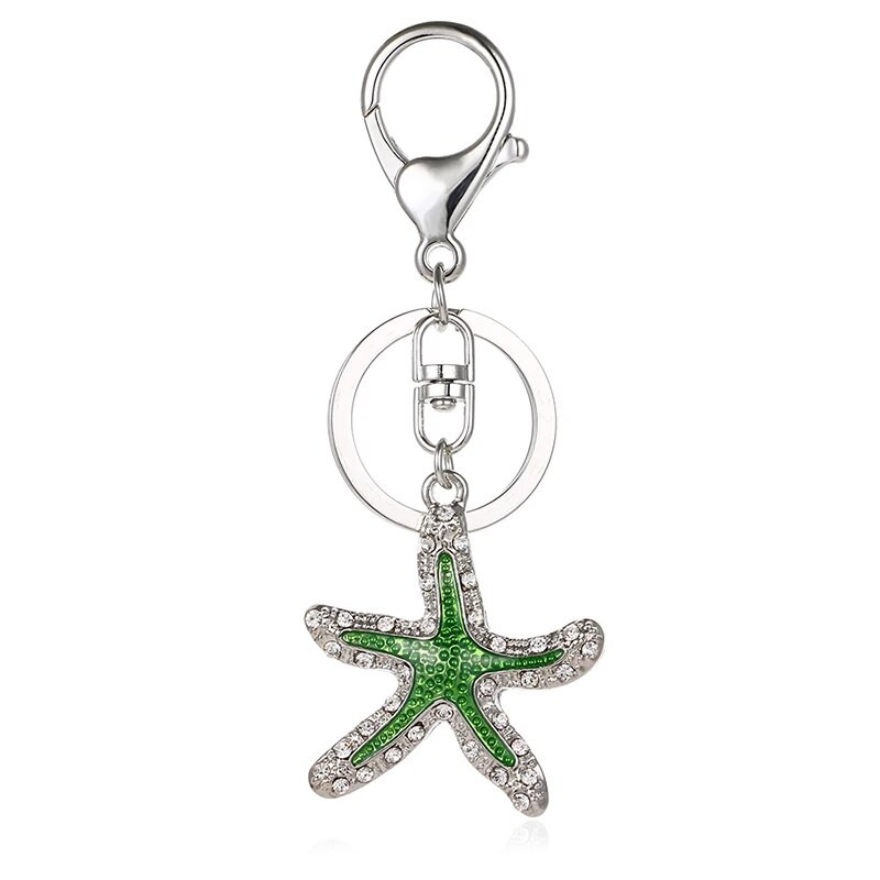 2020. gada modes jaunas krāsas kalnu kristāls, jauks, pilināms eļļas jūras zvaigzne, metāla soma, maka atslēgu piekariņš