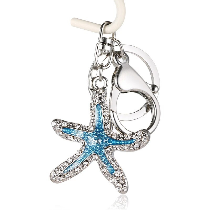 2020. gada modes jaunas krāsas kalnu kristāls, jauks, pilināms eļļas jūras zvaigzne, metāla soma, maka atslēgu piekariņš