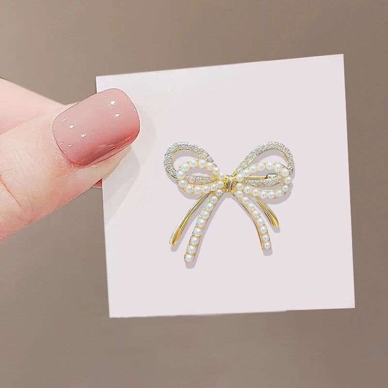 Izsmalcinātas Bowknot Pērļu saktas Sievietēm Pretgaismas korsāžas Modes Fiksēta Drēbju Piespraudes Rotaslietas Mazie Aksesuāri Dāvana