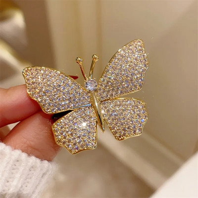 Rhinestone tauriņu saktas sievietēm sudraba krāsā, grezns dizains augstas kvalitātes kukaiņu atloka piespraudes Sieviešu mētelis korsāža kāzu dāvana