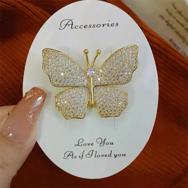 Rhinestone tauriņu saktas sievietēm sudraba krāsā, grezns dizains augstas kvalitātes kukaiņu atloka piespraudes Sieviešu mētelis korsāža kāzu dāvana