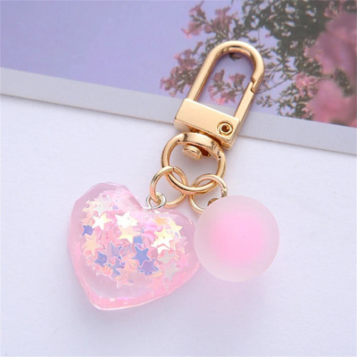 1 gab. Mīlestības atslēgu piekariņi Modes sirds formas atslēgu piekariņi, spīdīgi čipu pildīti sveķu atslēgu piekariņi sievietēm soma kuloni Valentīna dienas dāvana