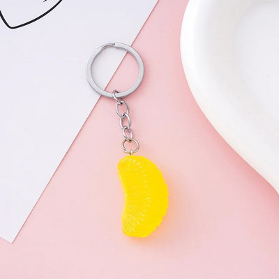 Simulācijas sveķu oranžo atslēgu piekariņu kulonu pārtikas un augļu atslēgu ķēdes vairumtirdzniecība