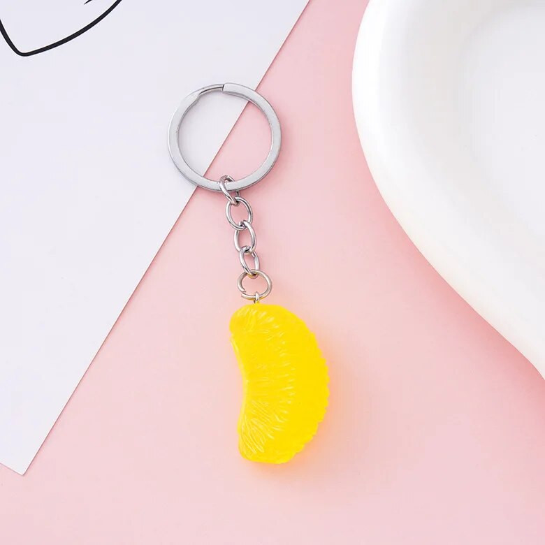 Simulācijas sveķu oranžo atslēgu piekariņu kulonu pārtikas un augļu atslēgu ķēdes vairumtirdzniecība