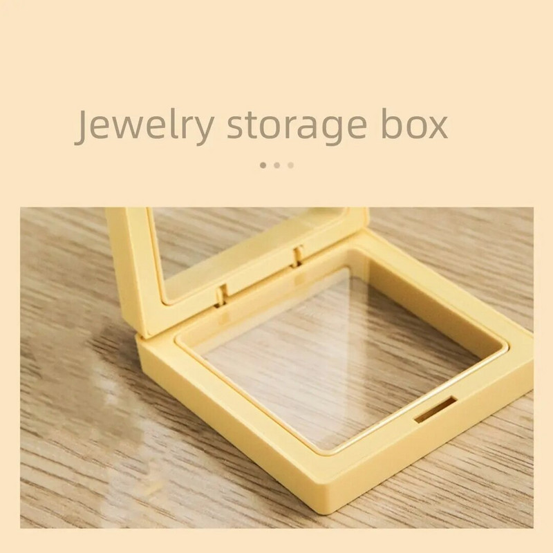 10 gab. Rotaslietu aksesuāri Iepakojuma displeja piederumi Uzglabāšanas kaste PE plēves balstiekārta caurspīdīga kaklarota