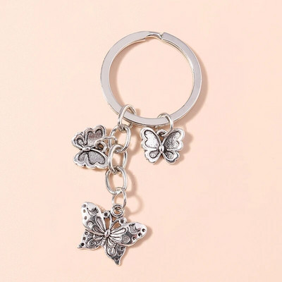 Jauki sakausējuma tauriņi atslēgu piekariņi metāla dzīvnieku atslēgu piekariņi kuloni atslēgu turētājam rokassomu dekoru piekariņi DIY rotaslietas dāvanas